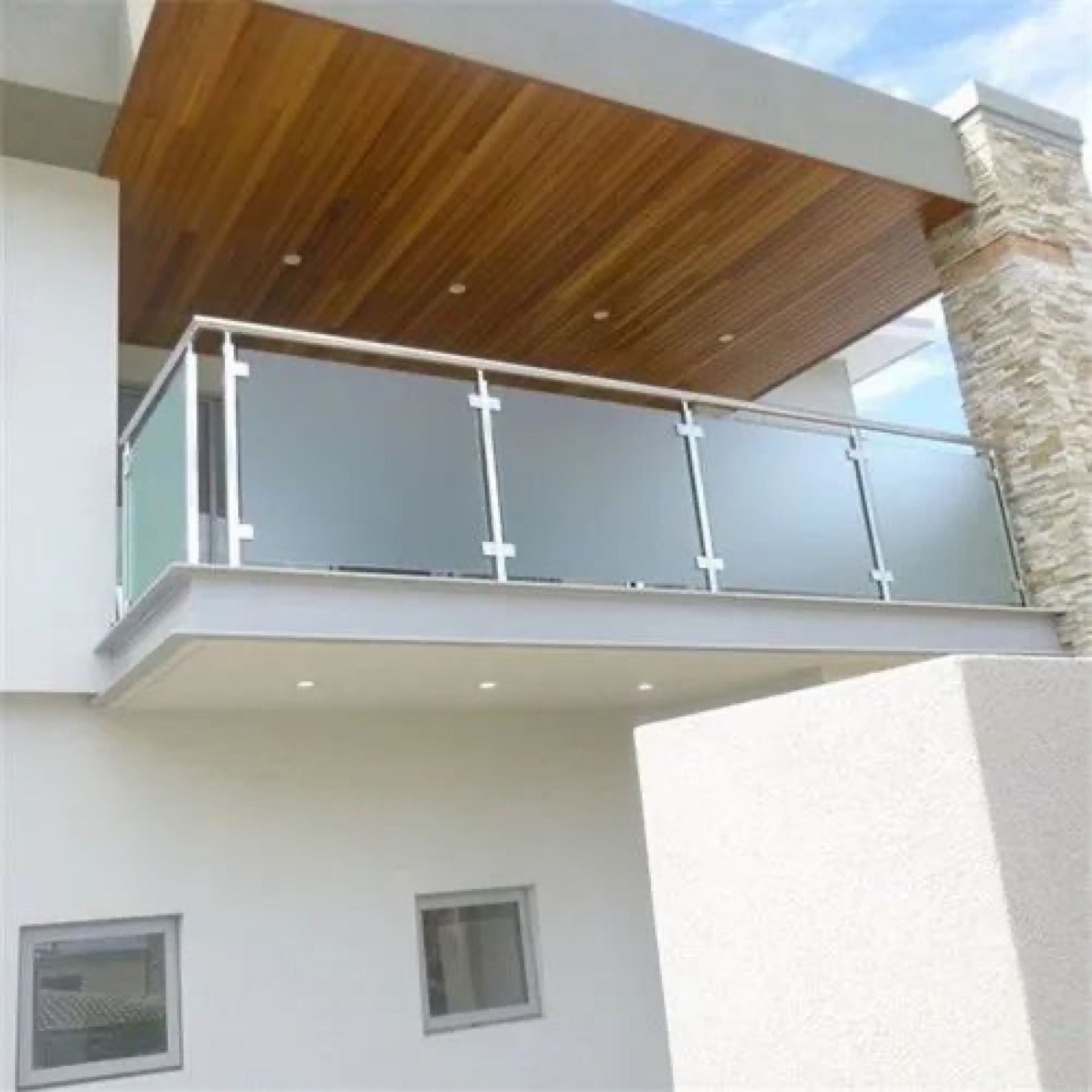 Real Classic Tuff balcony glass railing and facade project